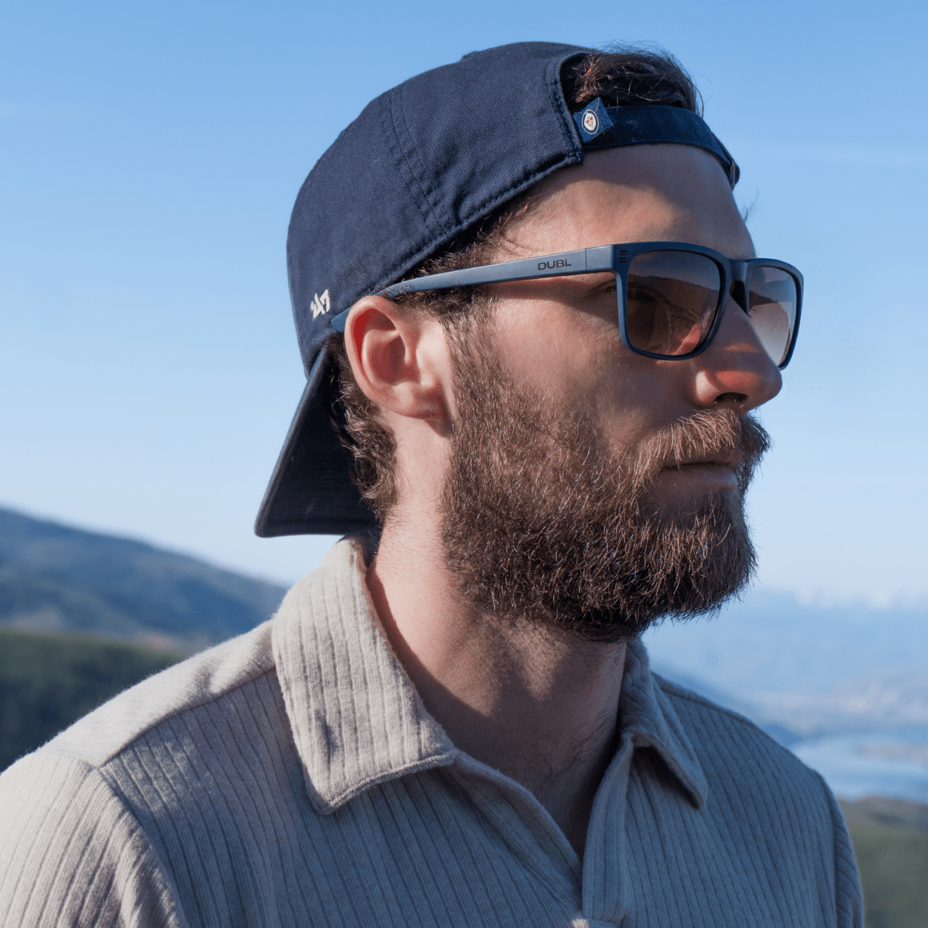 Navy | DUBL Hyperion Golf Sunglasses model shot